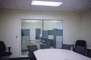 Spacious conference room with modern technology and comfortable seating